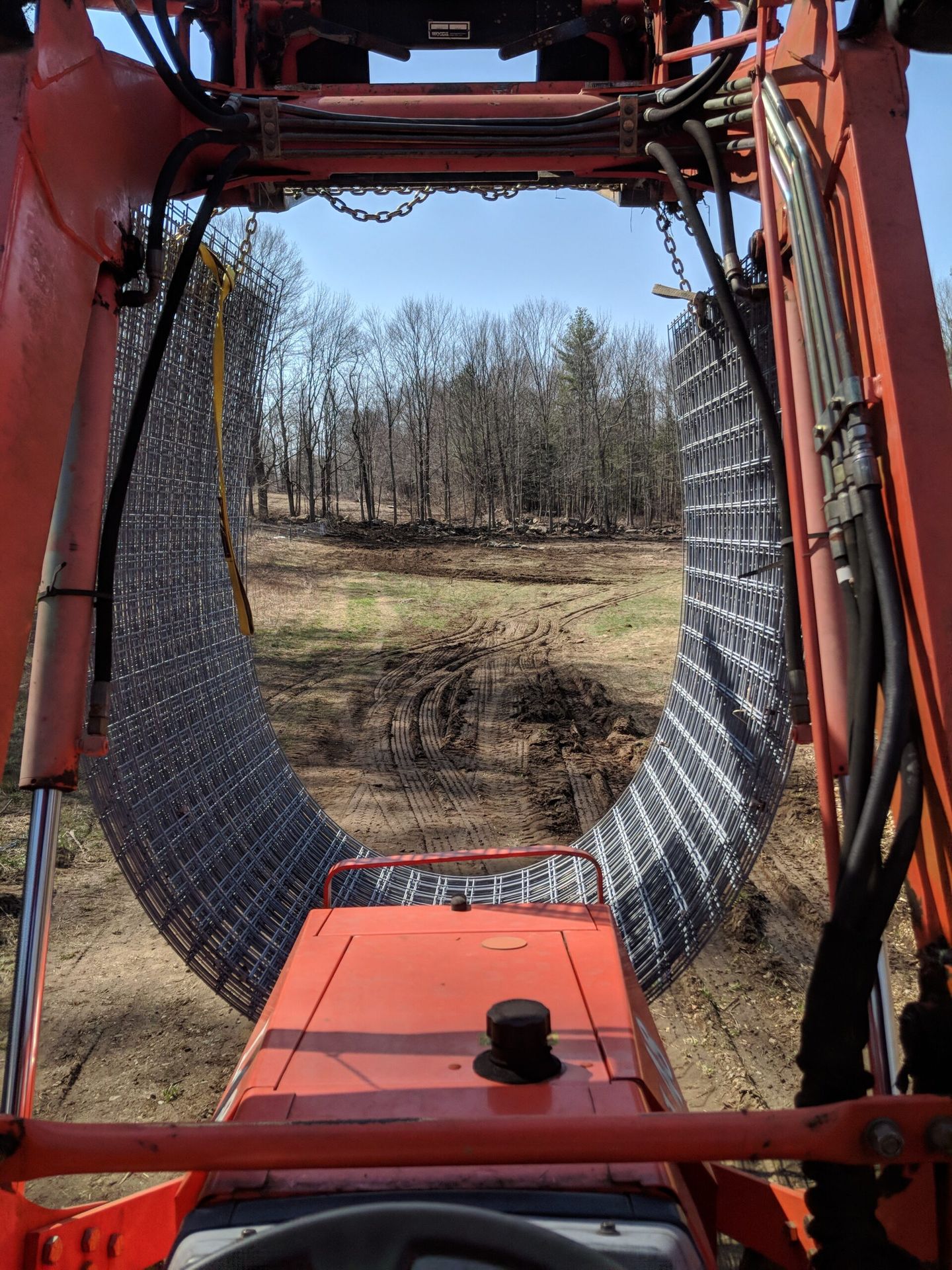 tractor moving fencing