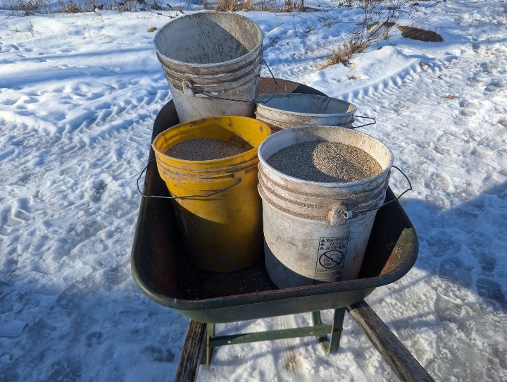 buckets in wheel barrel 