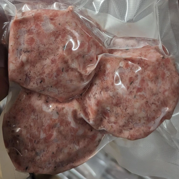 a close up of a package of raw breakfast patties