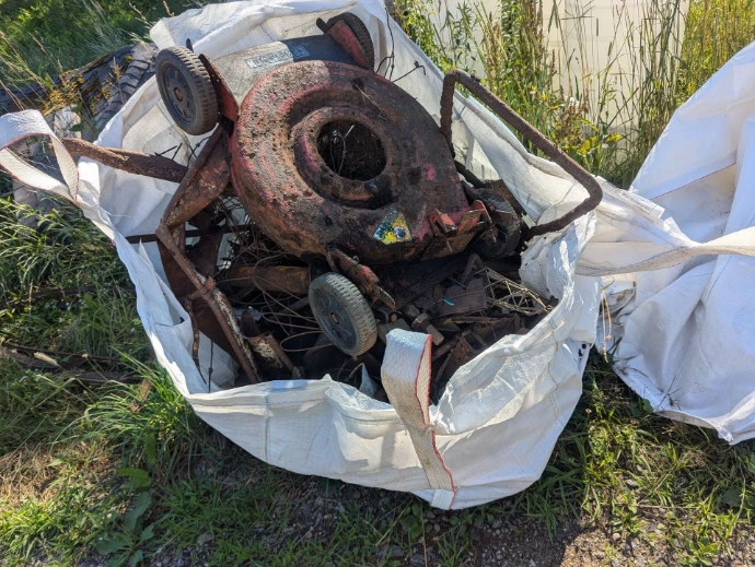 a one-ton sling tote filled with trash I found on my farm